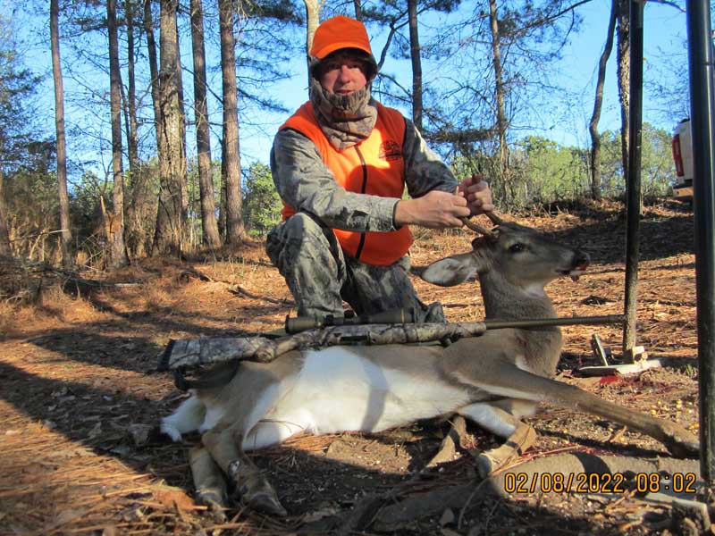 A spike buck, possibly 80 pounds
